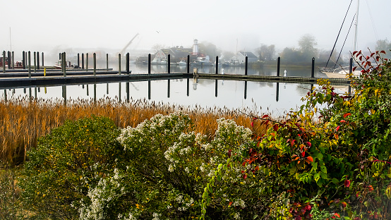 Norwalk, CT, USA - November 4, 2022: Beautiful morning fog in autumn near Norwalk river