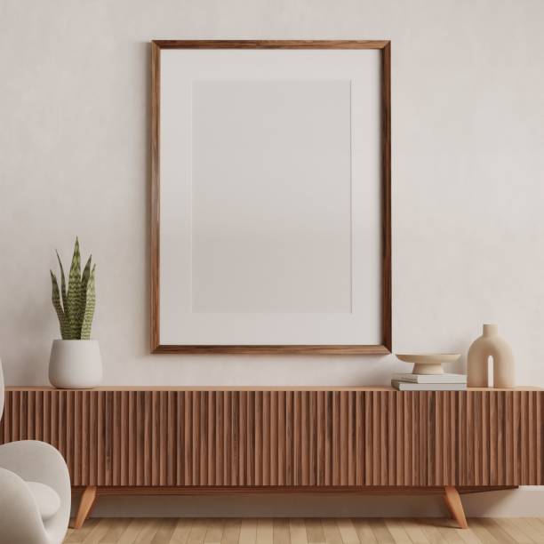 istock Vertical wood frame mockup in living room interior with light reflection. 3d rendering, 3d illustration 1439629657