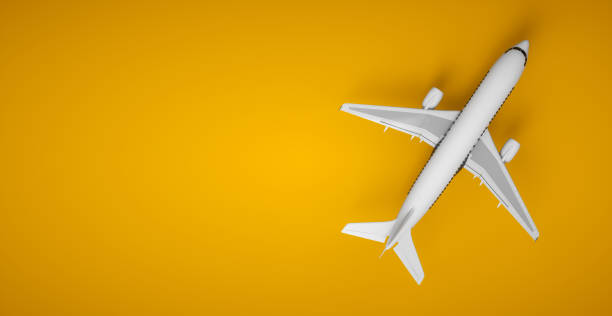 istock High detailed white plane, 3d rendering on a yellow background. Airplane take off. Airline concept. Travel passenger plane. Commercial jet plane. Top view. 1439636855