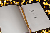 Open book with Page one of 365