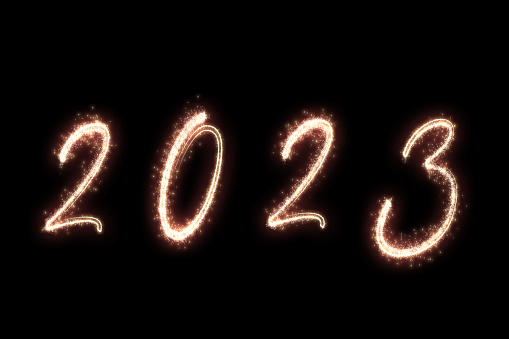 New Year 2023 numbers sparklers isolated on black background greeting card