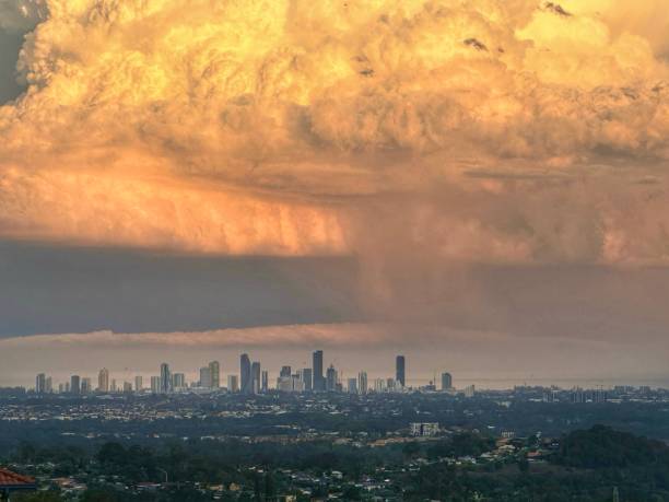 istock View looking out over the Surfers Paradise Skyline at a supercell cloud forming.  Highrise skyline in the background with houses and greenery in the foreground.  Gold Coast Queensland Australia 1439645909