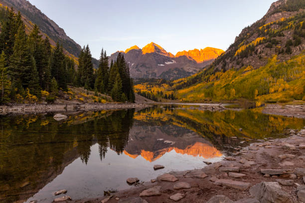 istock Maroon Bell lake sunrise 1439648628