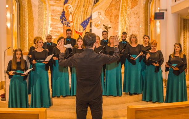 istock The conductor practices with the choir before the performance 1439652703