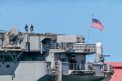 Australian Navy ship in the port, background with copy space, full frame horizontal composition