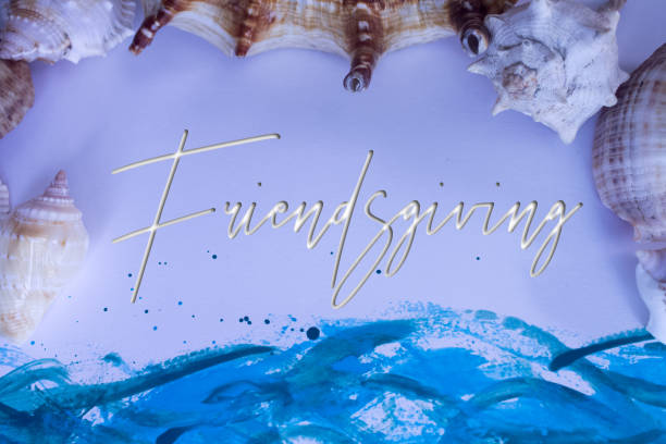 istock Animal Shell, Summer vacation, marine background with Friendsgiving text. 1439654036