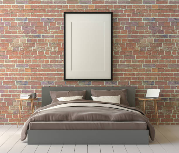 istock A bed in the room with a picture frame on the wall. 1439654995