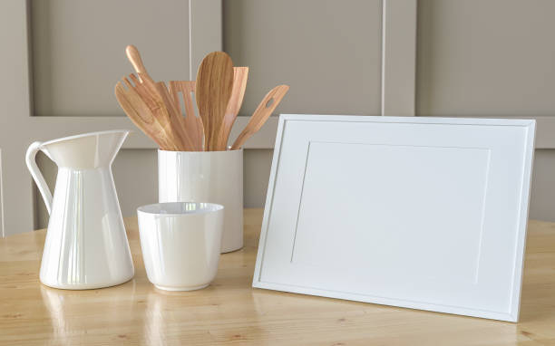 istock A picture frame on the floor with a flower vase. 1439655622