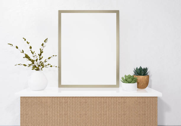 istock Picture frame attached to the wall and has a table at the bottom. 1439656546
