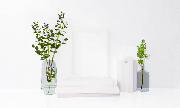 istock A picture frame on the floor with a flower vase. 1439656720