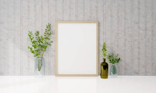 istock A picture frame on the floor with a flower vase. 1439656723