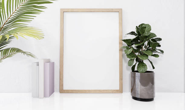 istock A picture frame on the floor with a flower vase. 1439656931