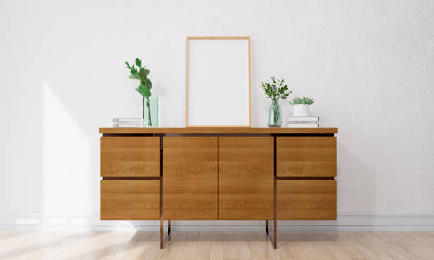 istock Picture frame attached to the wall and has a table at the bottom. 1439657733