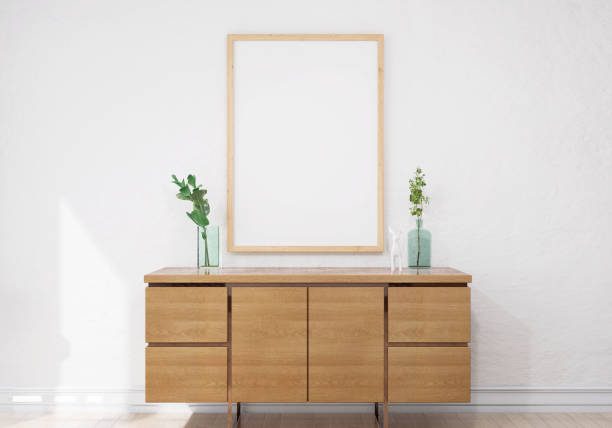 istock Picture frame attached to the wall and has a table at the bottom. 1439657735