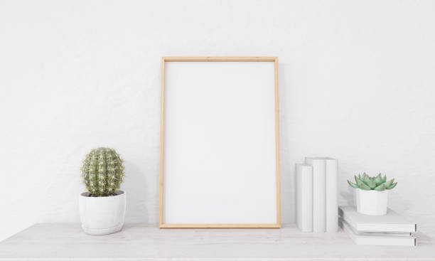istock A picture frame on the floor with a flower vase. 1439657861