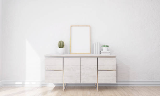 istock Picture frame attached to the wall and has a table at the bottom. 1439657866
