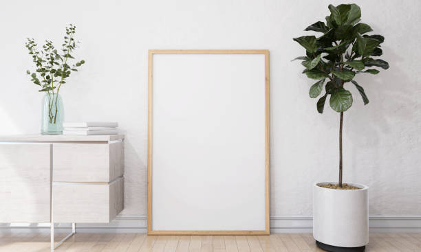 istock A picture frame on the floor with a flower pot. 1439658511