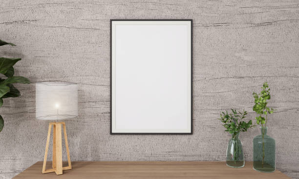 istock Picture frame attached to the wall and has a table at the bottom. 1439658716