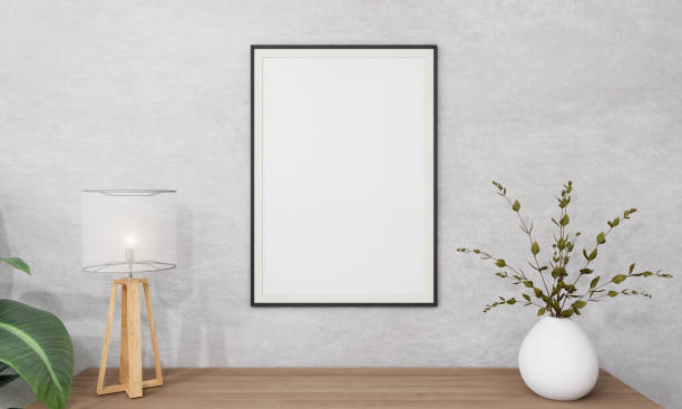 istock Picture frame attached to the wall and has a table at the bottom. 1439658718