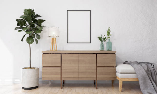 istock Picture frame attached to the wall and has a table at the bottom. 1439658719