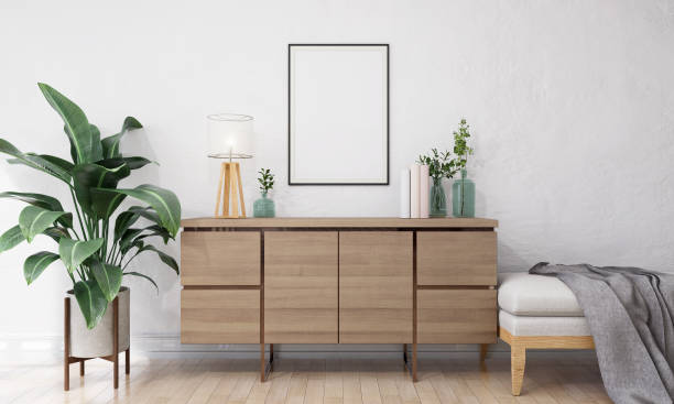 istock Picture frame attached to the wall and has a table at the bottom. 1439658728