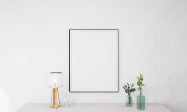 istock Picture frame attached to the wall and has a table at the bottom. 1439658867