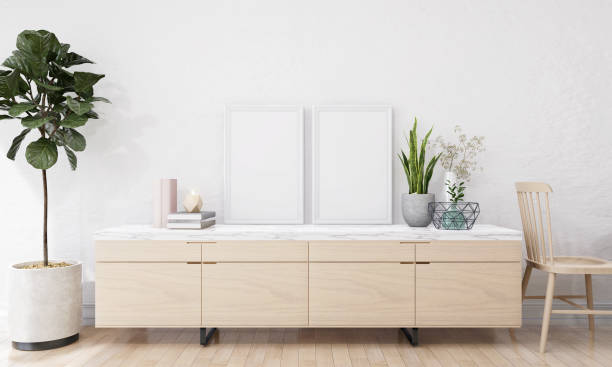 istock Picture frame attached to the wall and has a table at the bottom. 1439659594