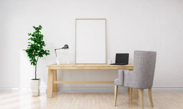 istock Picture frame attached to the wall and has a table at the bottom. 1439659886