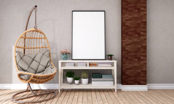 istock Picture frame attached to the wall, with chairs and vases placed on the table. 1439660677