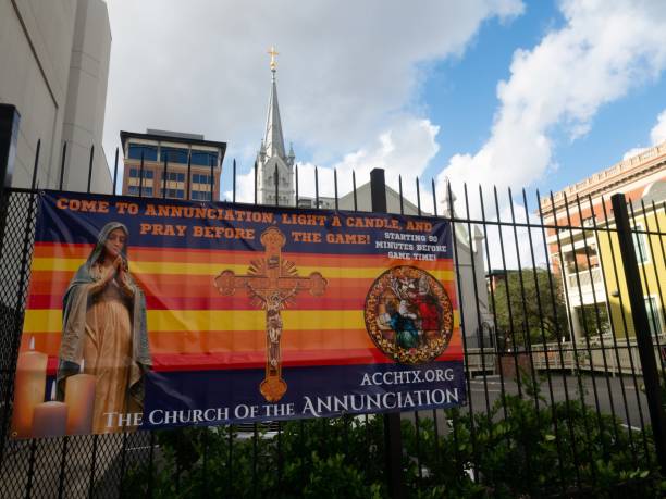 Church of the Annunciation Banner Supporting the Houston Astros with Prayers and Lighting Candles Church of the Annunciation Catholic Church near the Minute Maid Stadium announcing lighting candles and prayers before the Astros World Series baseball games. houston astros stock pictures, royalty-free photos & images