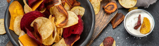 istock Bowl of healthy colorful vegetable chips 1439660763