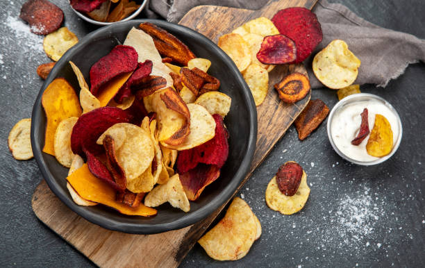 istock Bowl of healthy colorful vegetable chips 1439660789