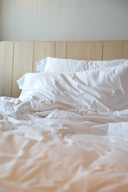 istock white bed and pillows in the room 1439661740