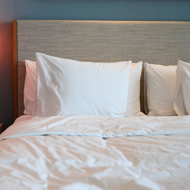 istock white bed and pillows in the room 1439661741