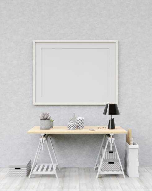 istock Picture frame attached to the wall and has a table at the bottom. 1439662092