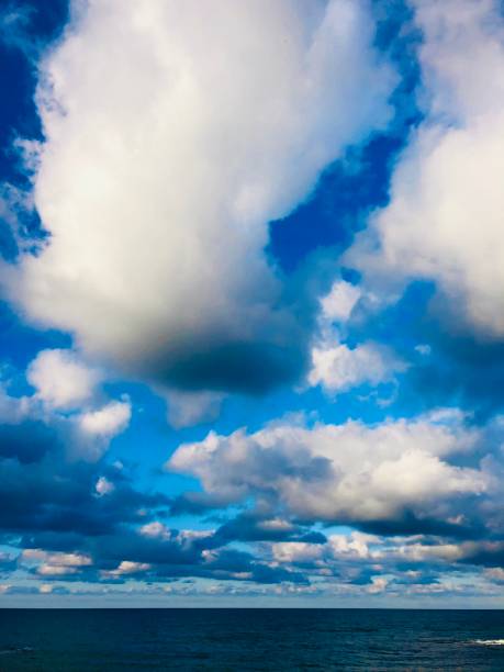 istock Cloudy sky view from the seaside 1439666180