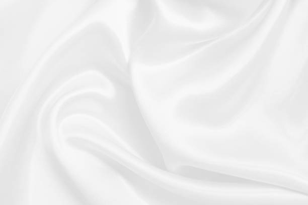 istock White fabric texture background, detail of silk or linen pattern. 1439667056