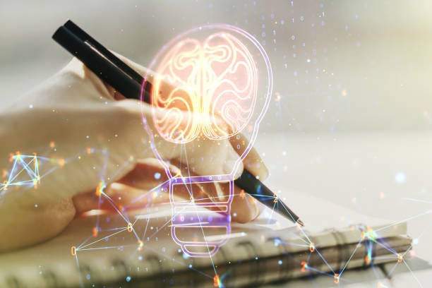 istock Creative idea concept with light bulb and human brain illustration and with woman hand writing in notebook on background. Neural networks and machine learning concept. Multiexposure 1439667216