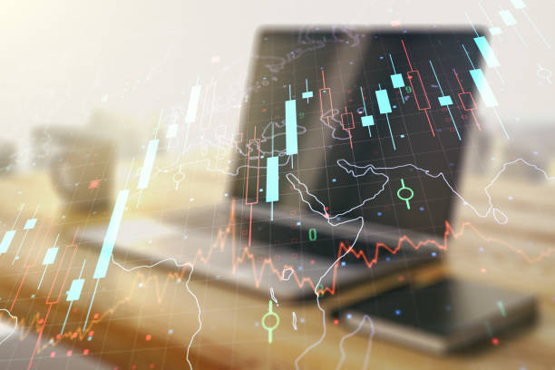istock Multi exposure of abstract creative financial chart with world map and modern desktop with laptop on background, research and analytics concept 1439667267