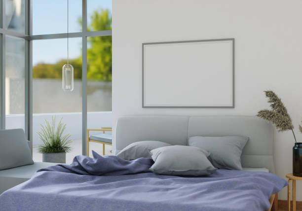 istock A bed in the room with a picture frame on the wall. 1439667447