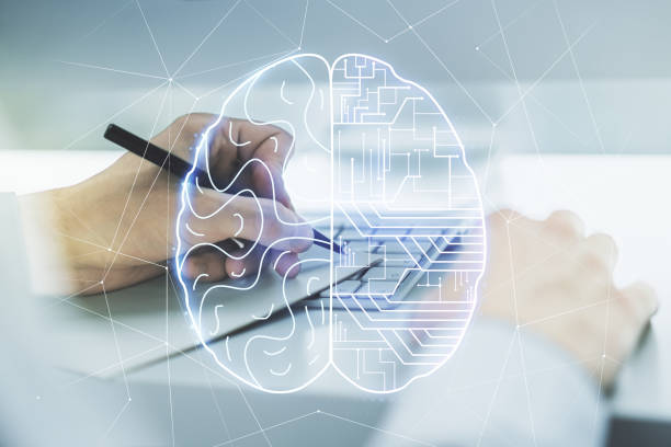 istock Creative artificial Intelligence concept with human brain sketch and hand writing in diary on background with laptop. Double exposure 1439667484