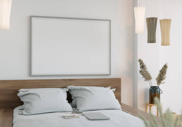 istock A bed in the room with a picture frame on the wall. 1439667524