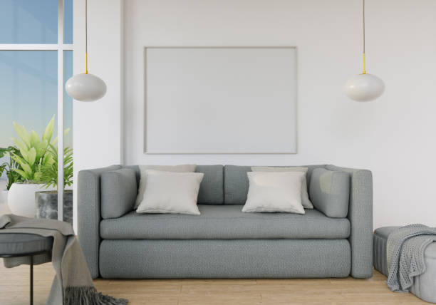 istock Picture frame attached to the wall, with chairs and vases placed on the table. 1439668336