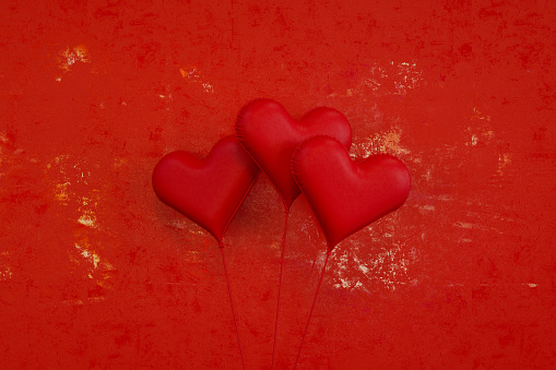 Valentine's day heart balloon on red background.