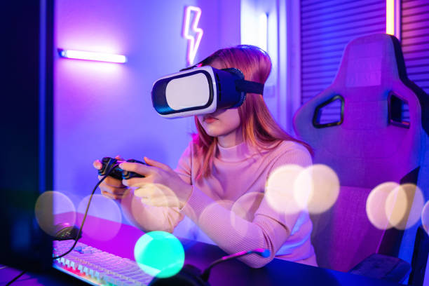 istock Gamer in VR headset glasses exploring metaverse play video game online with joystick 1439668634