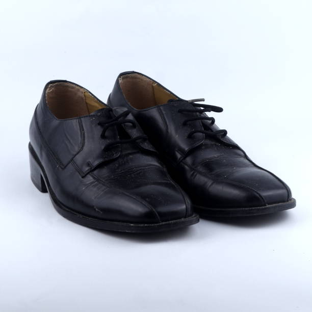 istock classic black leather shoes isolated on a white background 1439669411