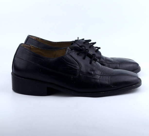 istock classic black leather shoes isolated on a white background 1439669472