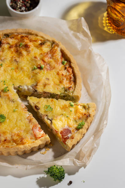 istock Freshly baked quiche with salmon and broccoli 1439669779
