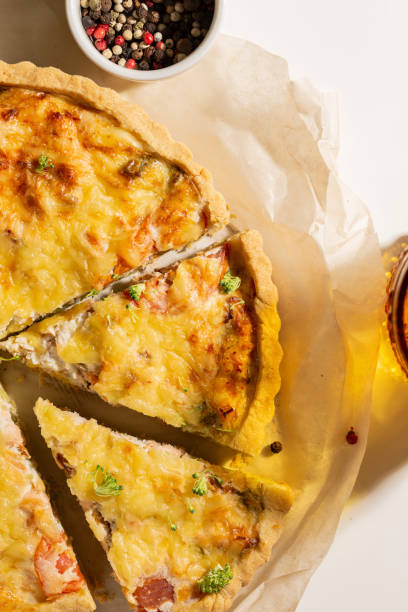 istock Dinner with fresh homemade pie with salmon fish and broccoli, quiche 1439669790