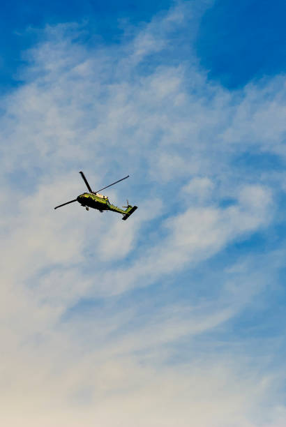 Alexandria, Virginia, USA - October 6, 2022: A U.S. Marine Corps VH-60N “White Hawk” executive transport helicopter from MHX-1 flies overhead on a sunny autumn afternoon.